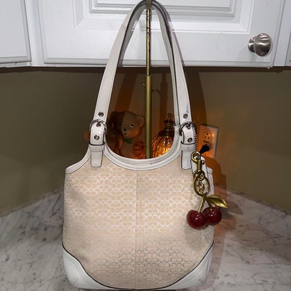 Coach Soho Hobo Bag (Style M3K-7025) in a cream and white color way